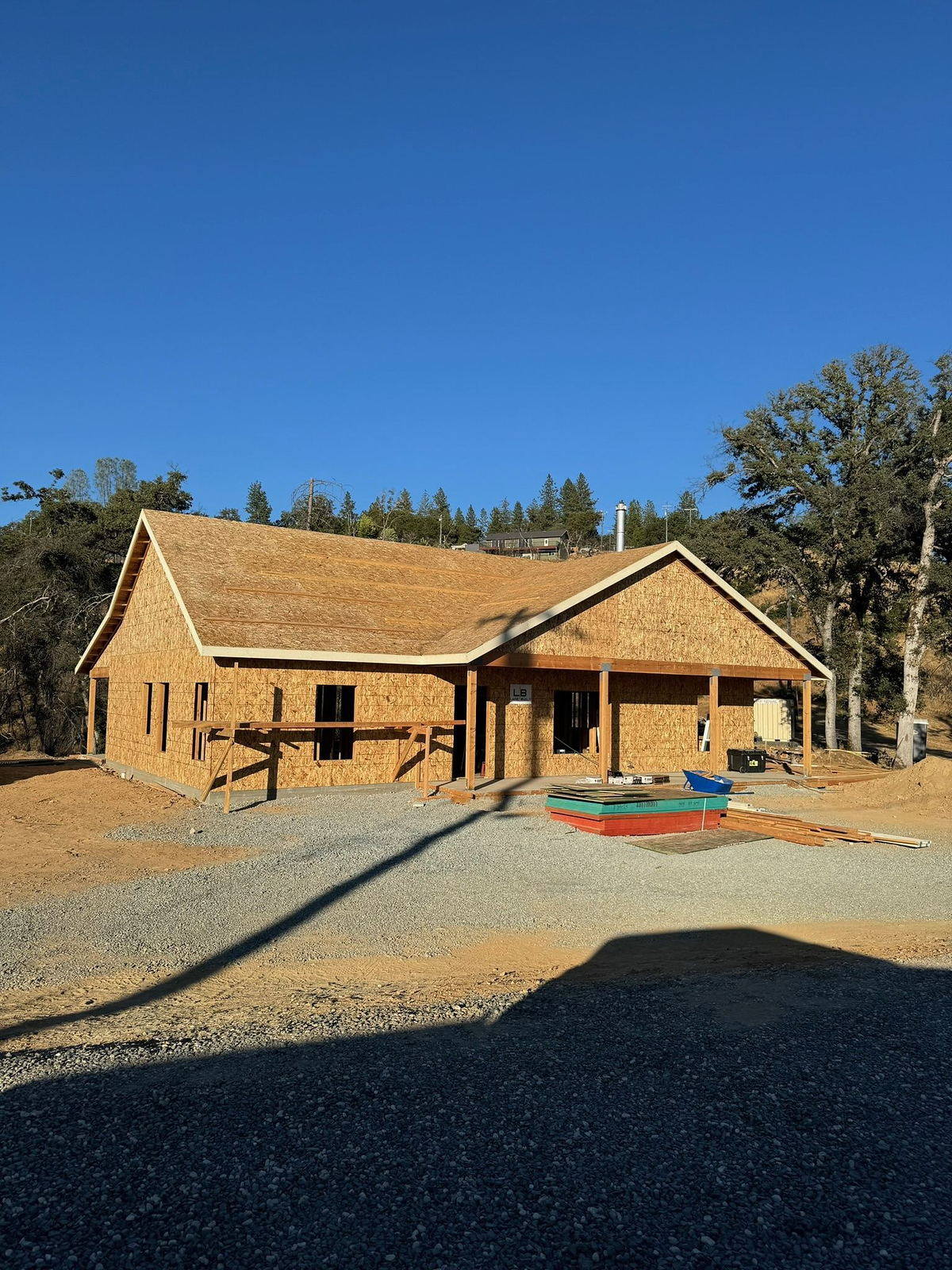Framed multi-unit structure under construction by Lane Built Inc.